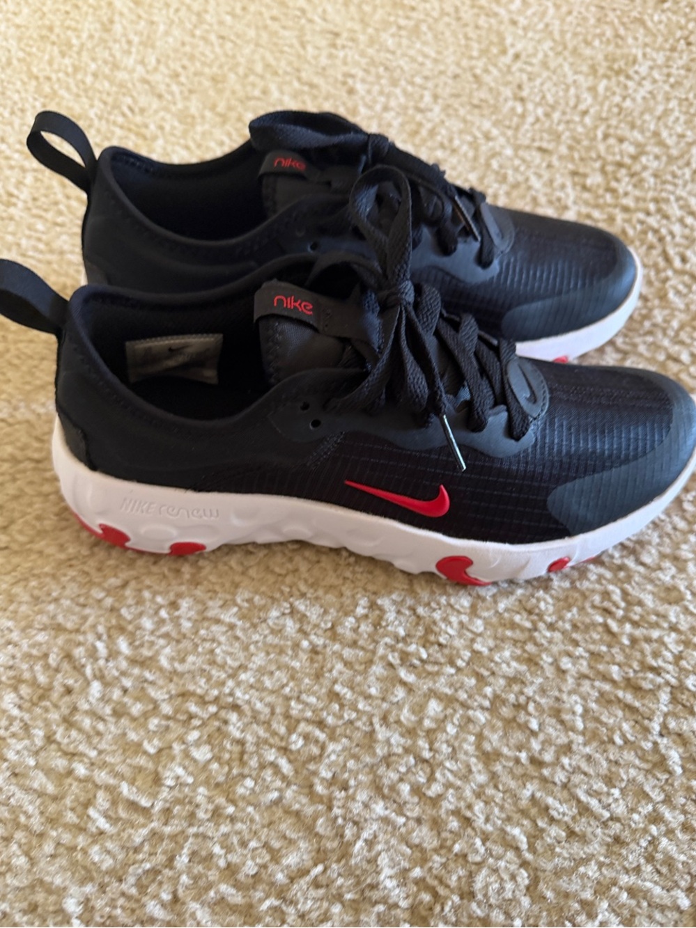 Nike Black Sneakers with Red Swoosh and White Sole
